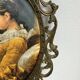 Brass frame and silk upholstery