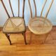 4 mismatched antique bistro chairs in wood and caning