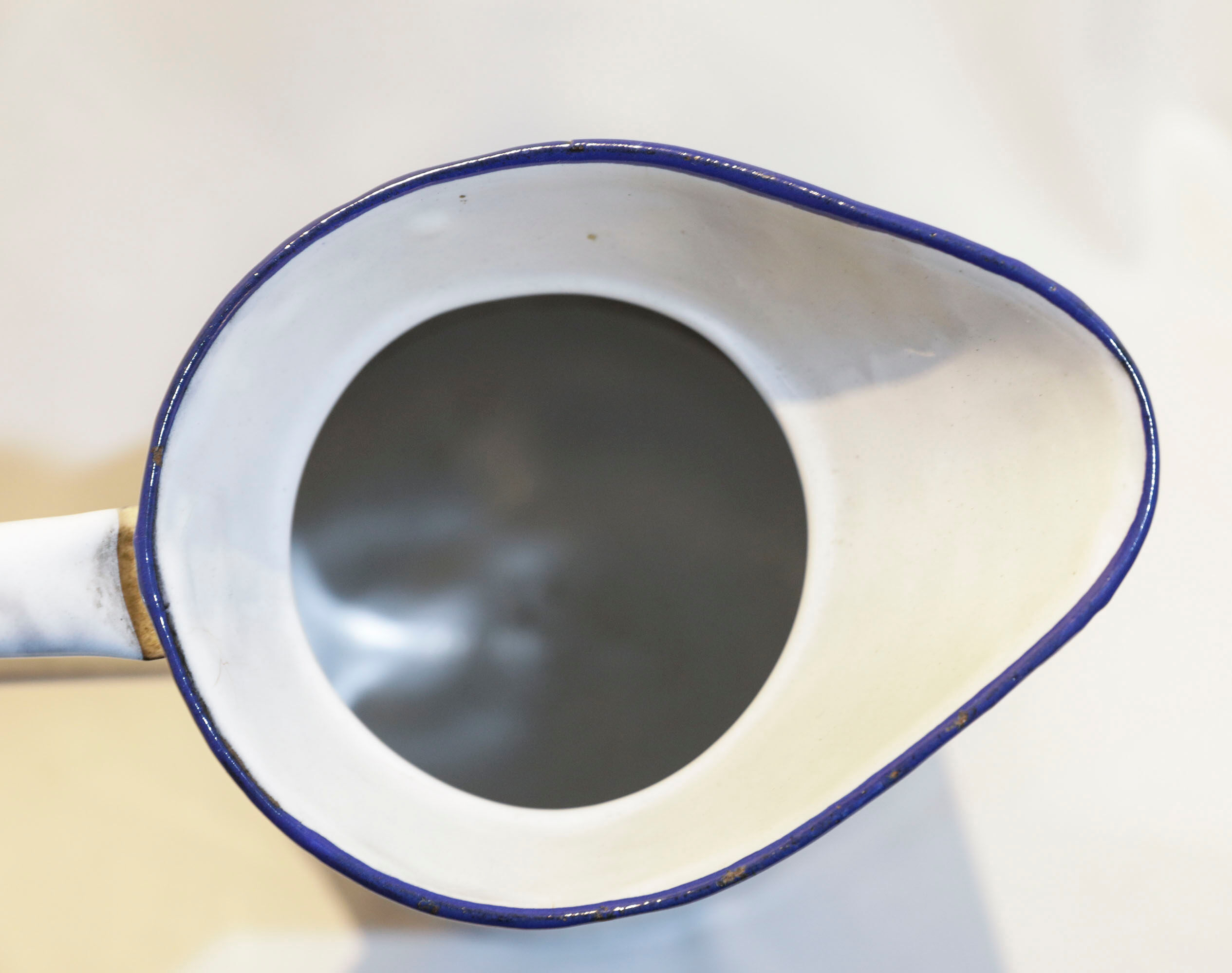 Enamelled metal watering can