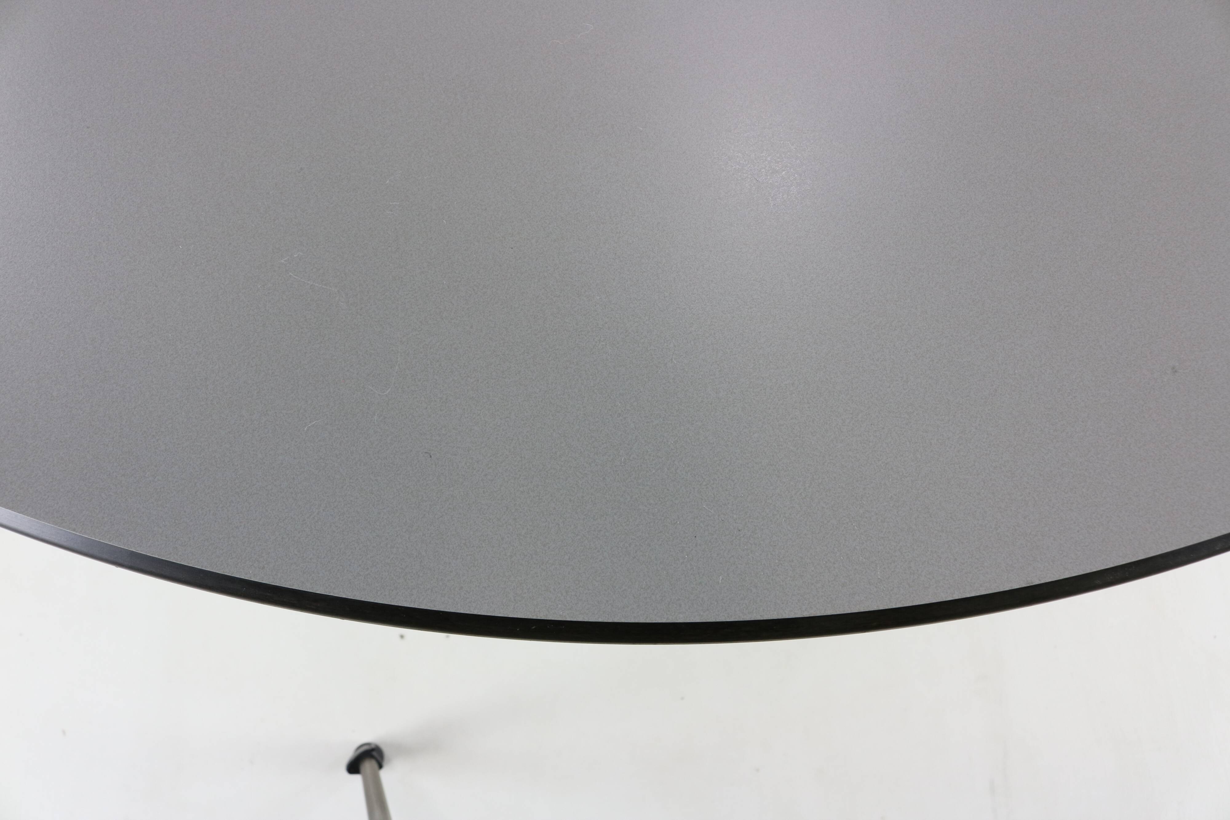 Eighties design Dutch design dining table with beautiful thin top