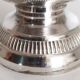 Silver-plated sugar shaker with fluted edges