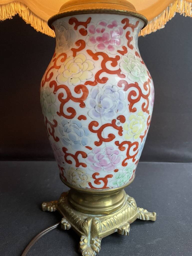 Old Asian vase mounted as a lamp with pagoda lampshade