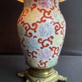 Old Asian vase mounted as a lamp with pagoda lampshade