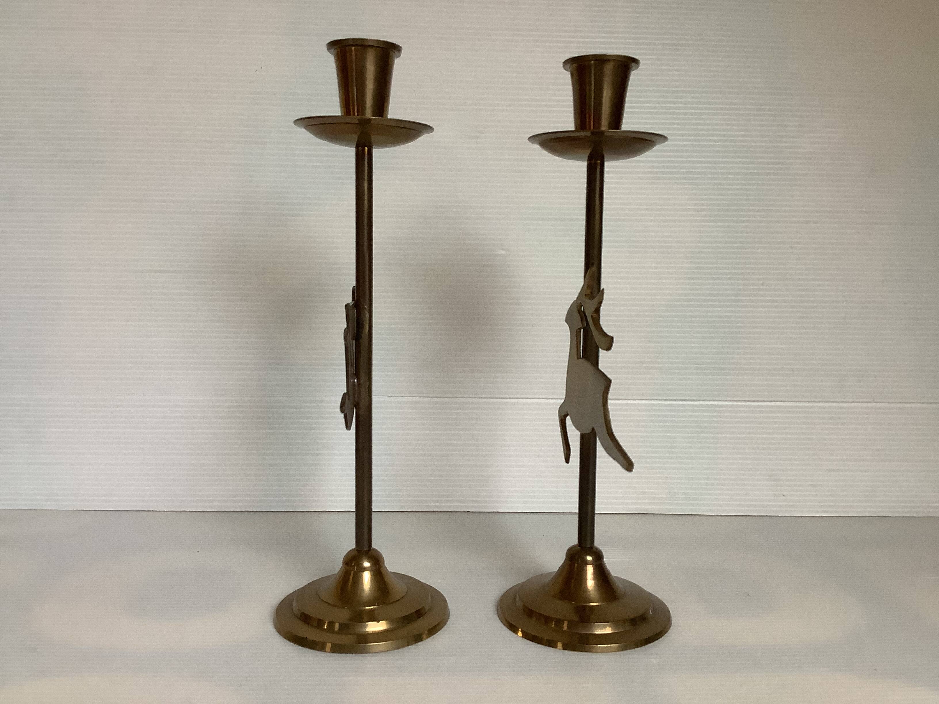 Pair of brass Christmas angel and reindeer candle holders