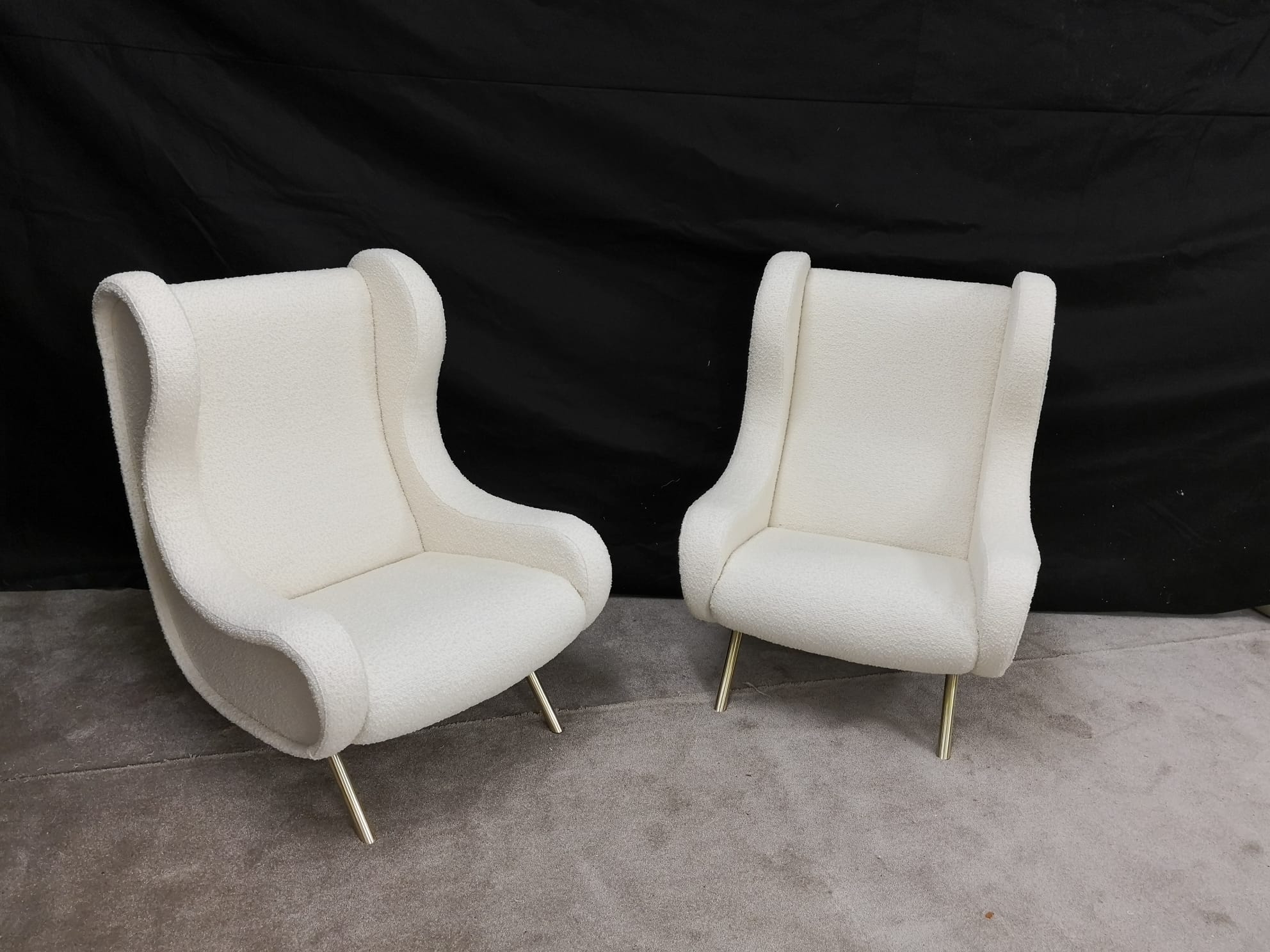 Pair of white buckle chairs