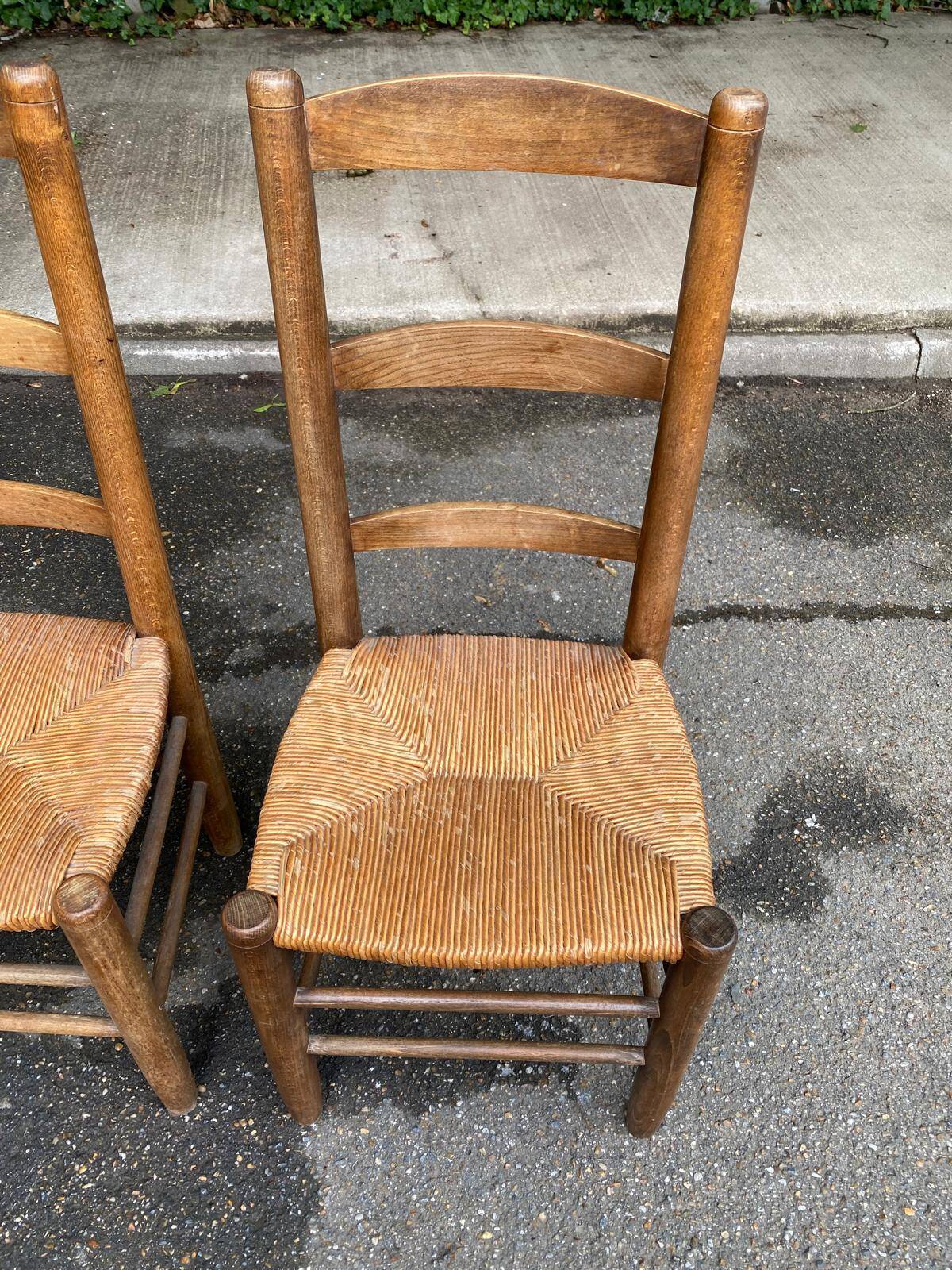 2 solid wood chairs in dark oak and high elephant straw
