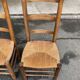 2 solid wood chairs in dark oak and high elephant straw