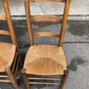 2 solid wood chairs in dark oak and high elephant straw