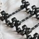 6 vintage black metal knife rests with scroll decorations