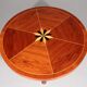 Italian mid-century dining table with stunning inlay star