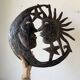 Brutalist metal wall sculpture "sun-moon"