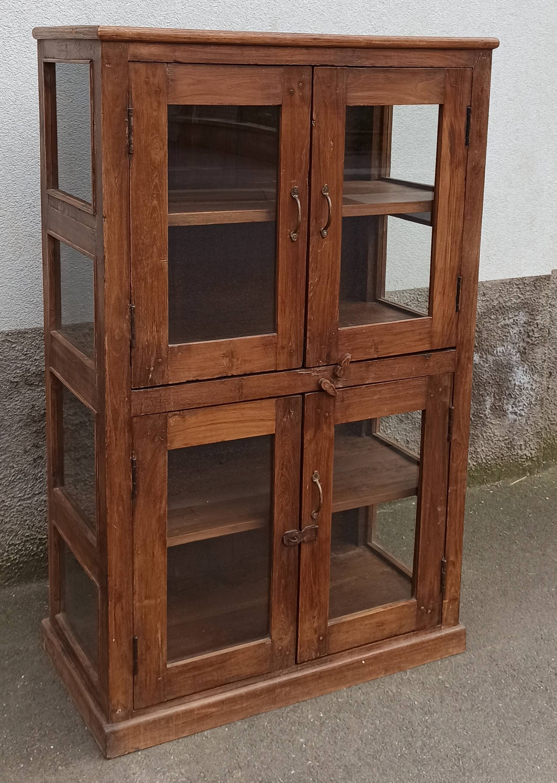Old wooden display cabinet with three glazed sides