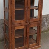 Old wooden display cabinet with three glazed sides