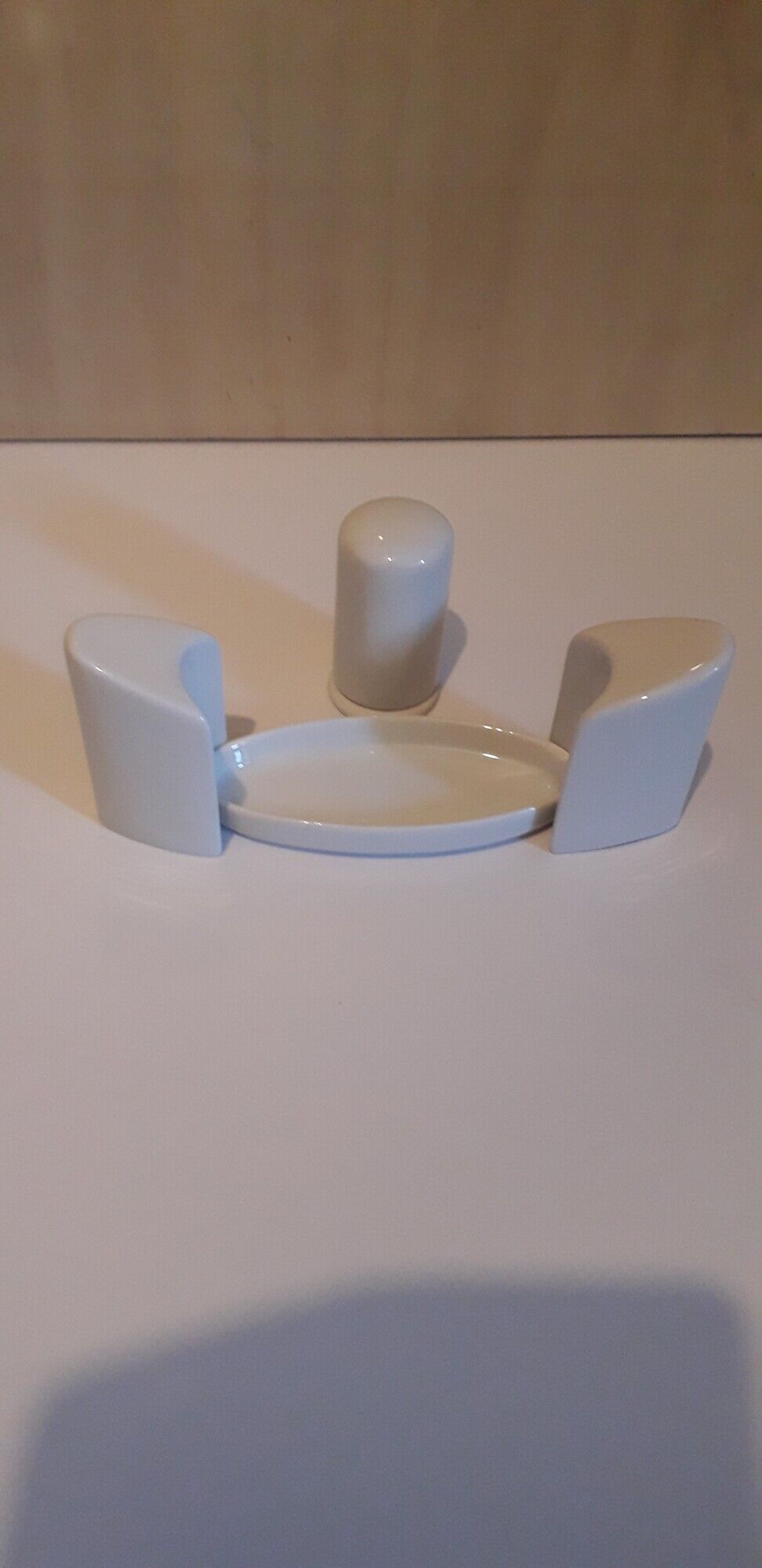 Set salt shaker, pepper tree and covered ceramic pot on small tray