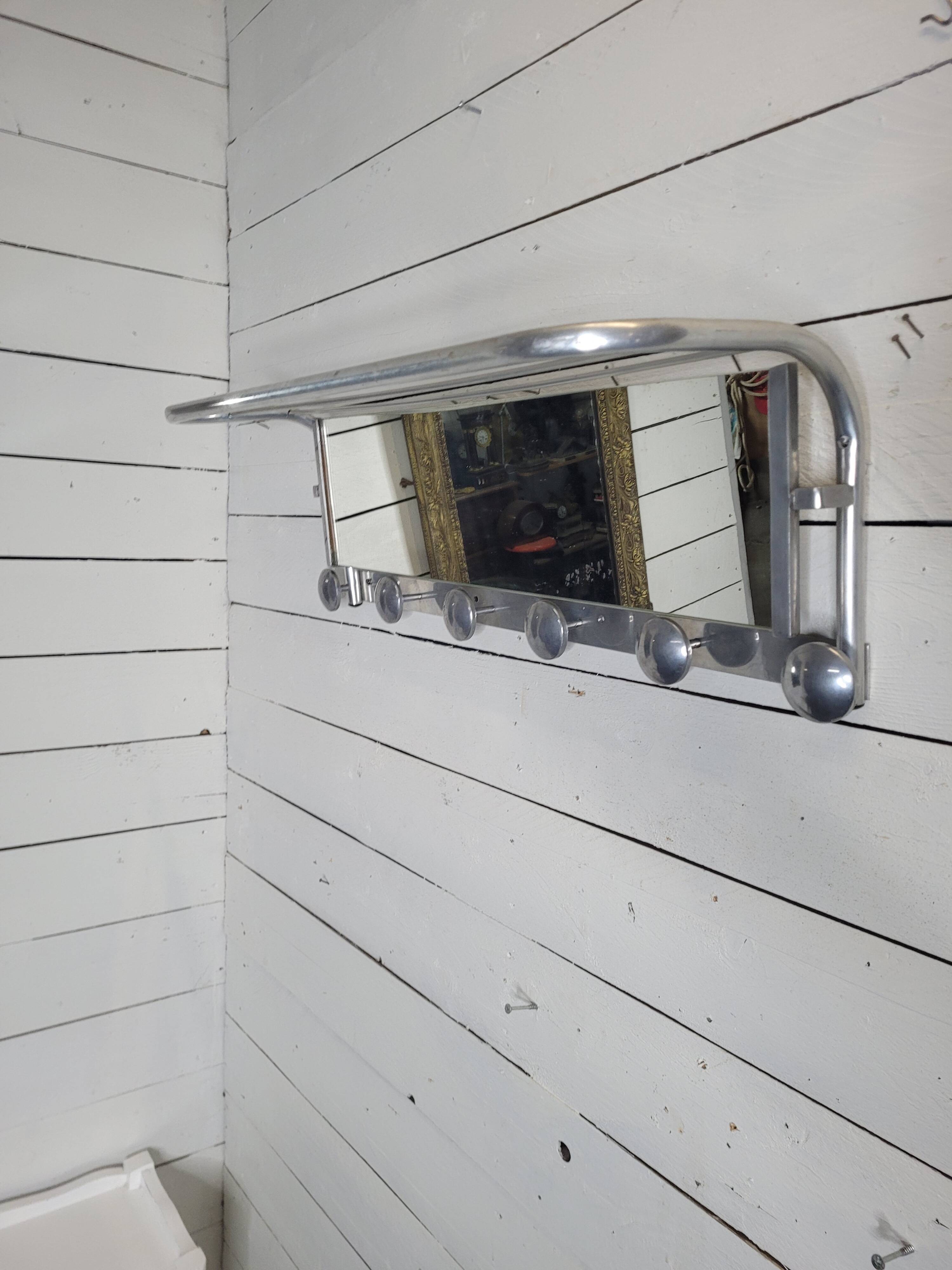 Aluminum wall coat rack with pivoting mirror from the 60s