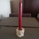 Candlestick in carved stone, signed