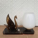 Art Deco swan and white globe table lamp with black marble base