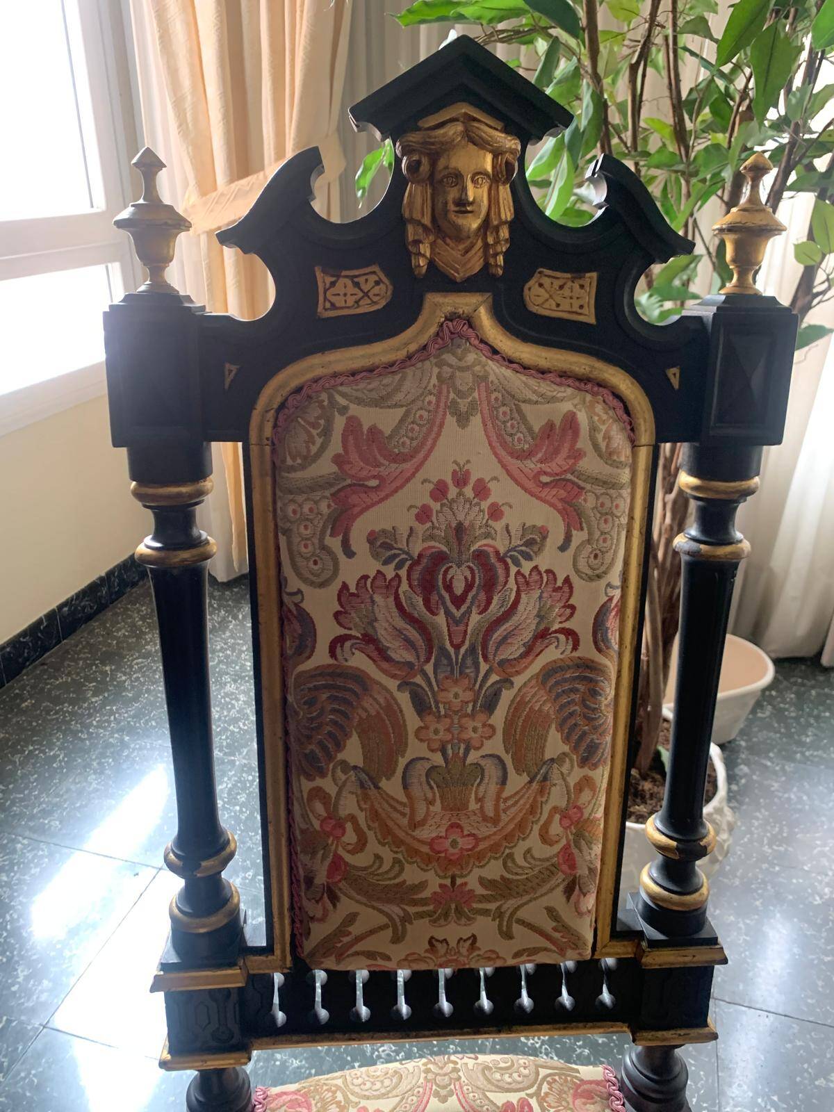 Historicist chair in ebonised and gilded wood