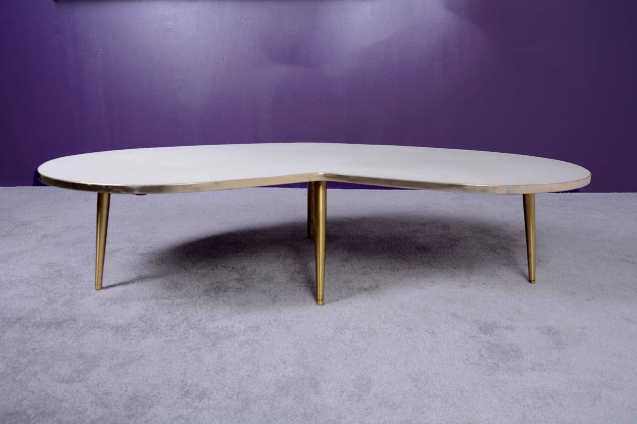 Free-form coffee table dating from the 60s,