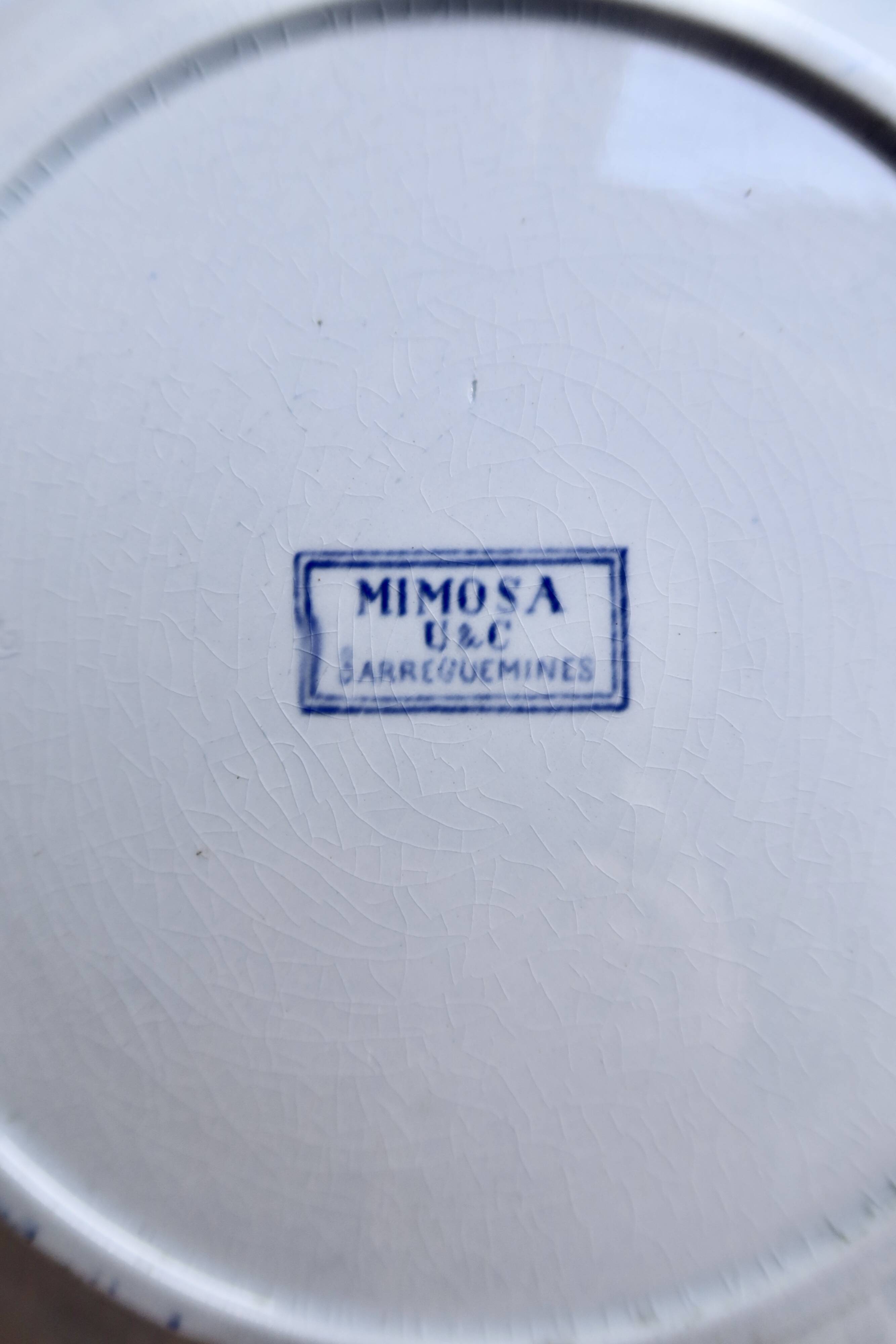 4 antique flat plates from Sarreguemines U&C in the Mimosa blue pattern.