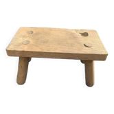 Small bench, footrest in artisanal raw wood