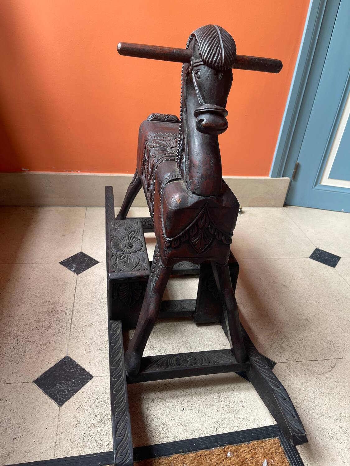 Antique carved wooden rocking horse