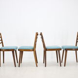 Ensemble de quatre chaises à manger années 1960.
