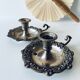 Pair of silver metal candlesticks