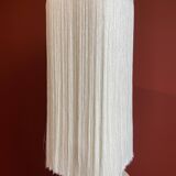 Beige marble stucco base, Houles white ecru fringed lampshade.