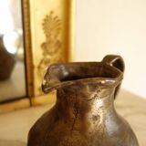 Old solid metal pitcher