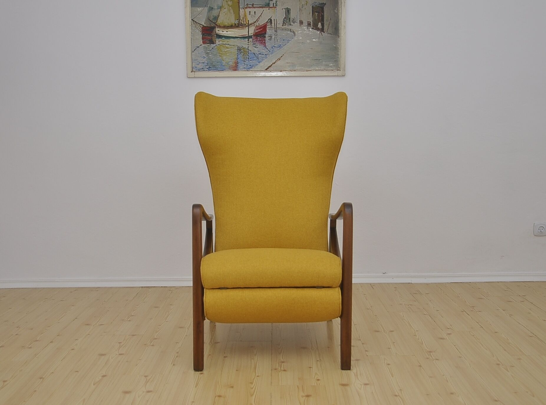Mid-century Wingback armchair with folding footrest, 1960s