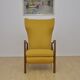 Mid-century Wingback armchair with folding footrest, 1960s