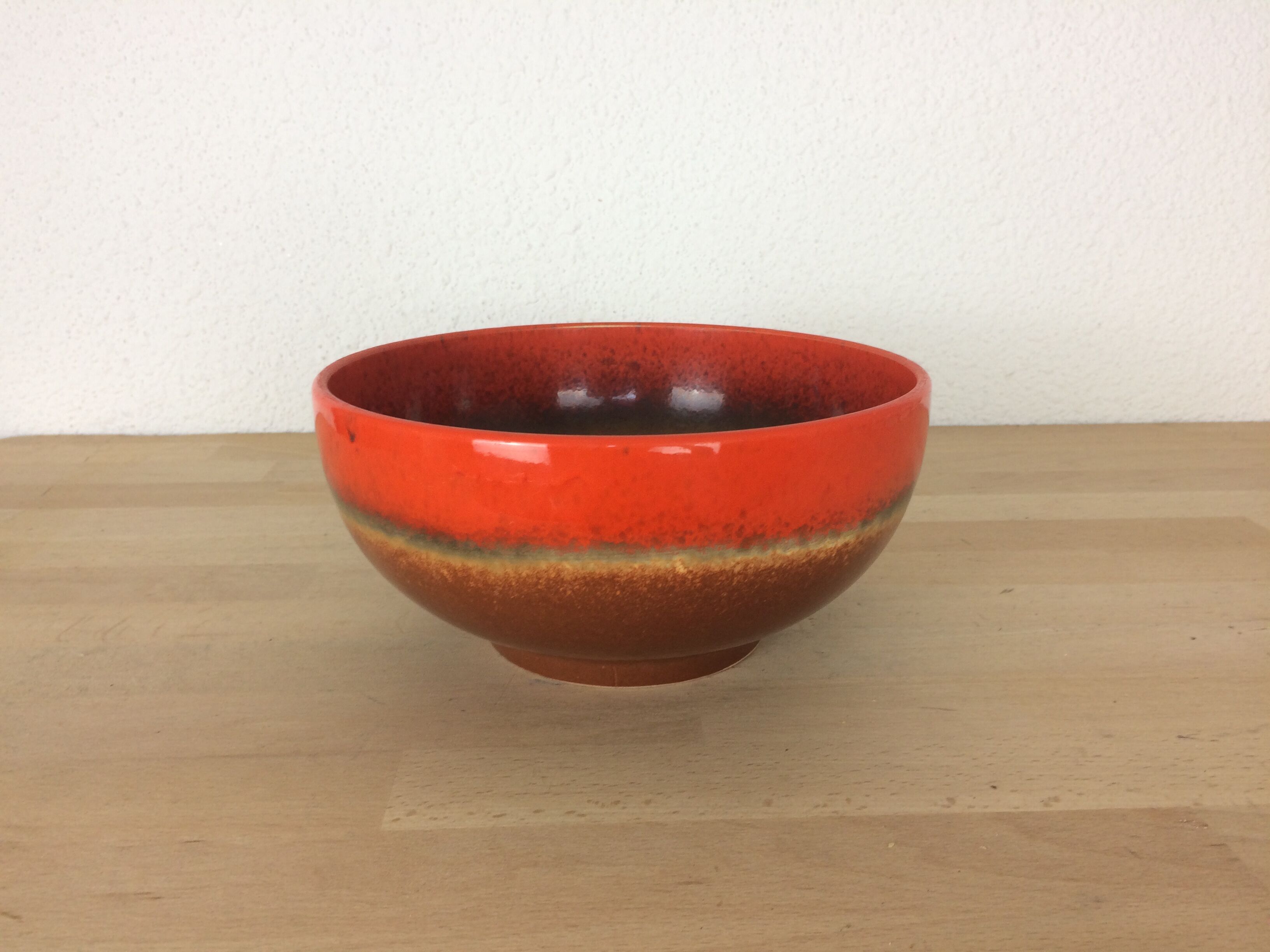 Orange and brown ceramic salad