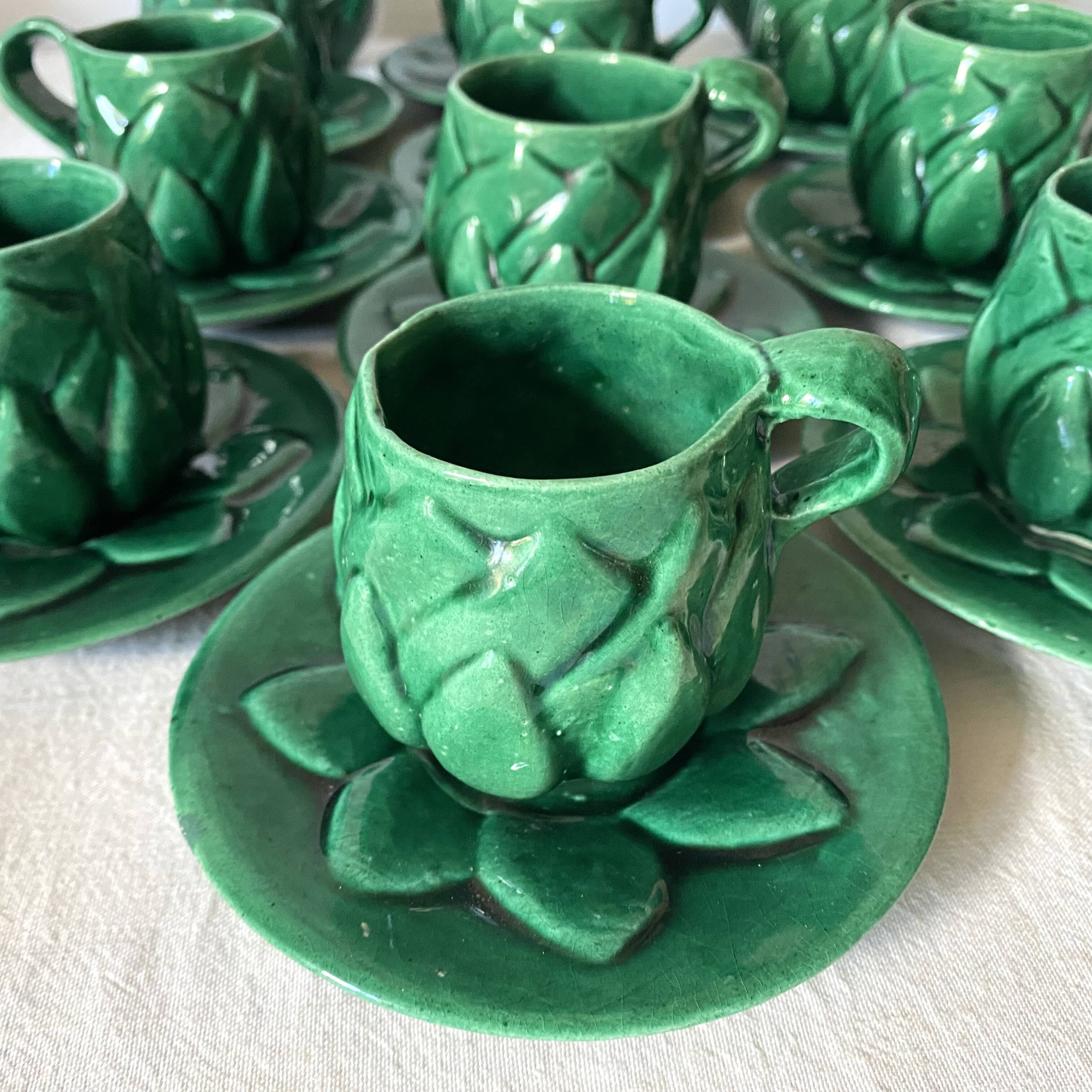 Antique slip cups with saucers, sugar bowl and milk pitcher