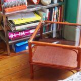 Varnished rattan coffee table and smoked glass top