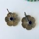 Pair of brass clover candlesticks