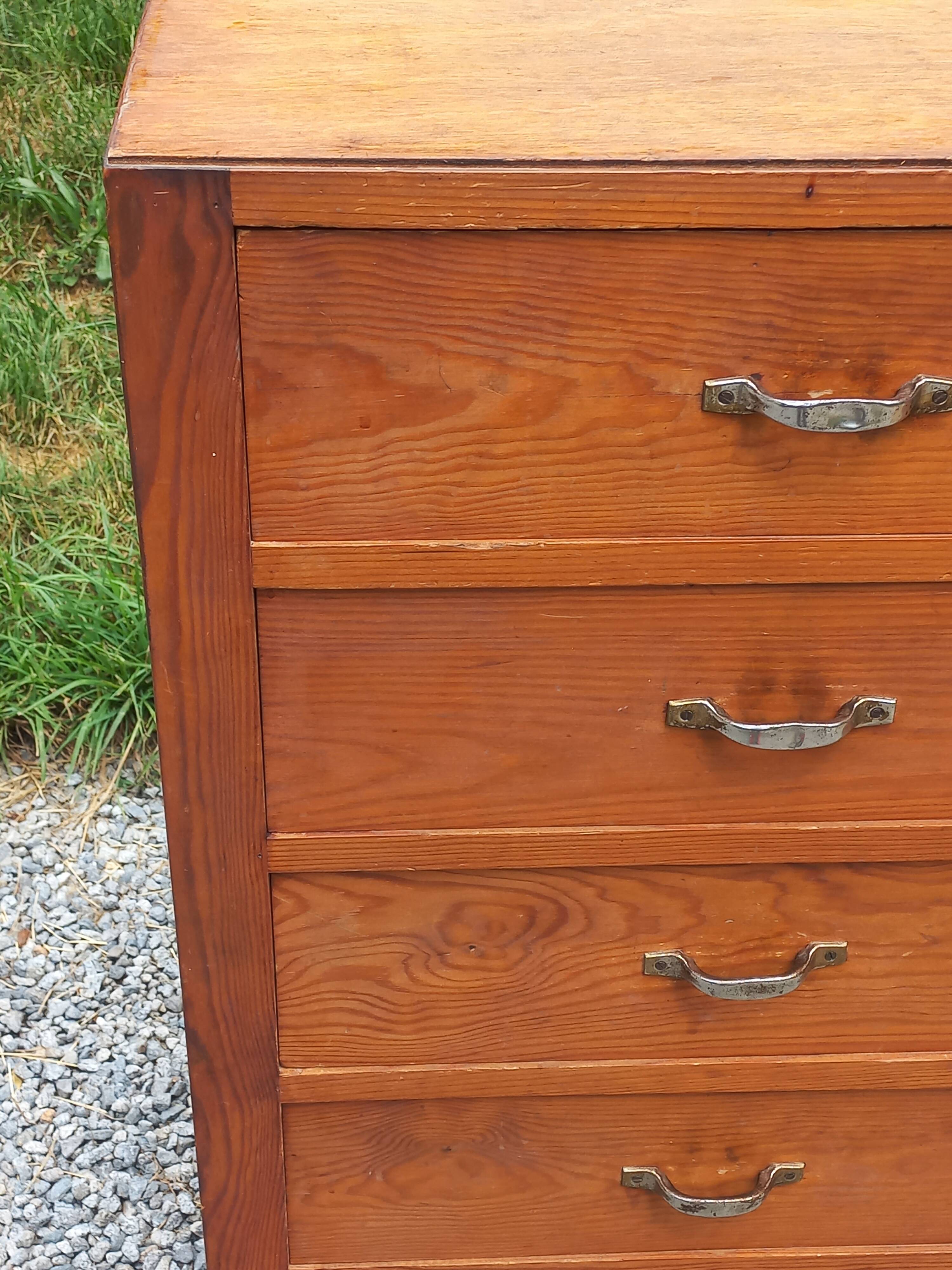 Vintage 1950s chest of drawers with tapered legs and 5 drawers.
