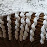 Old crocheted bedside table/plaid