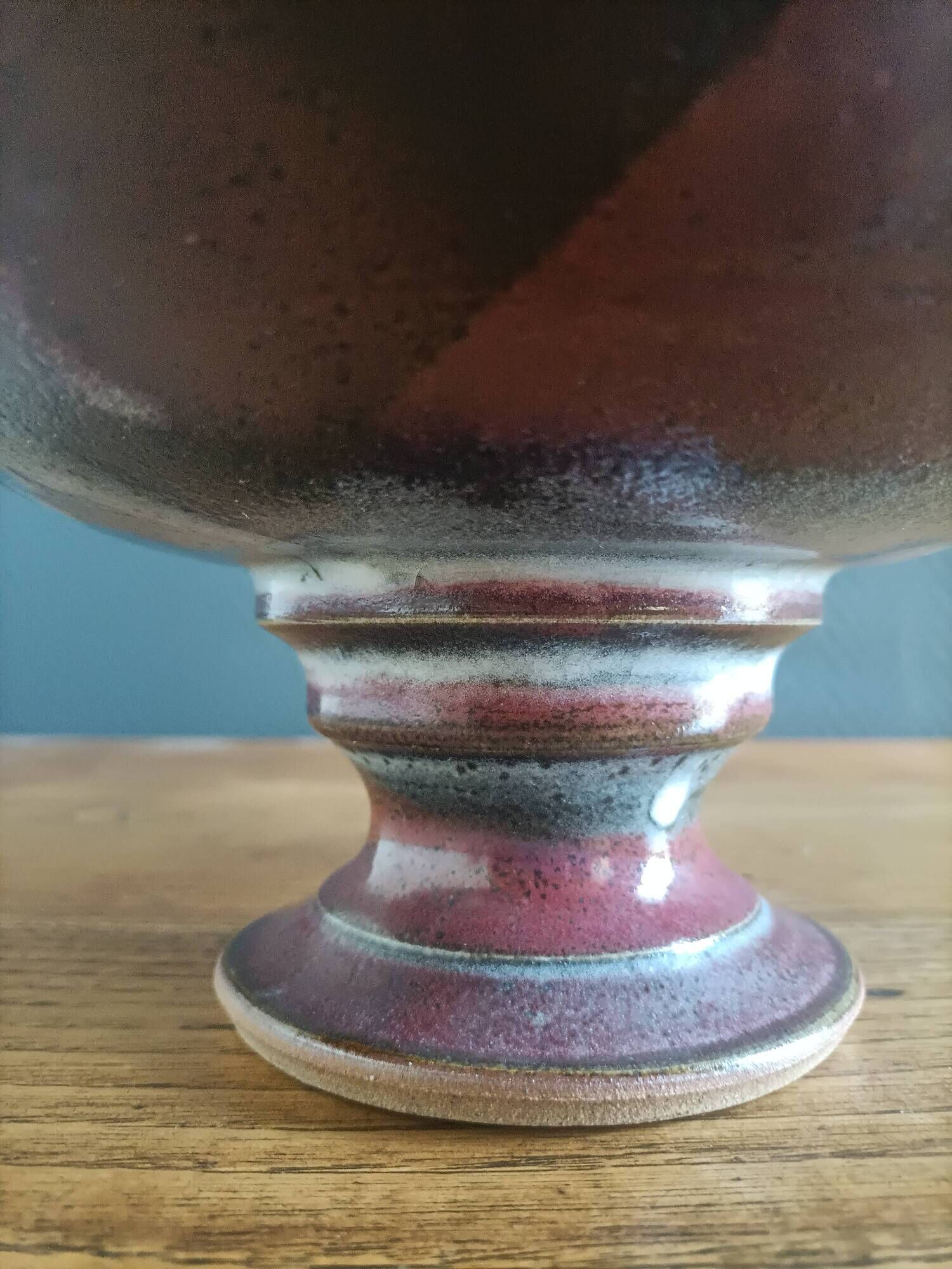 Signed ceramic fruit bowl on foot