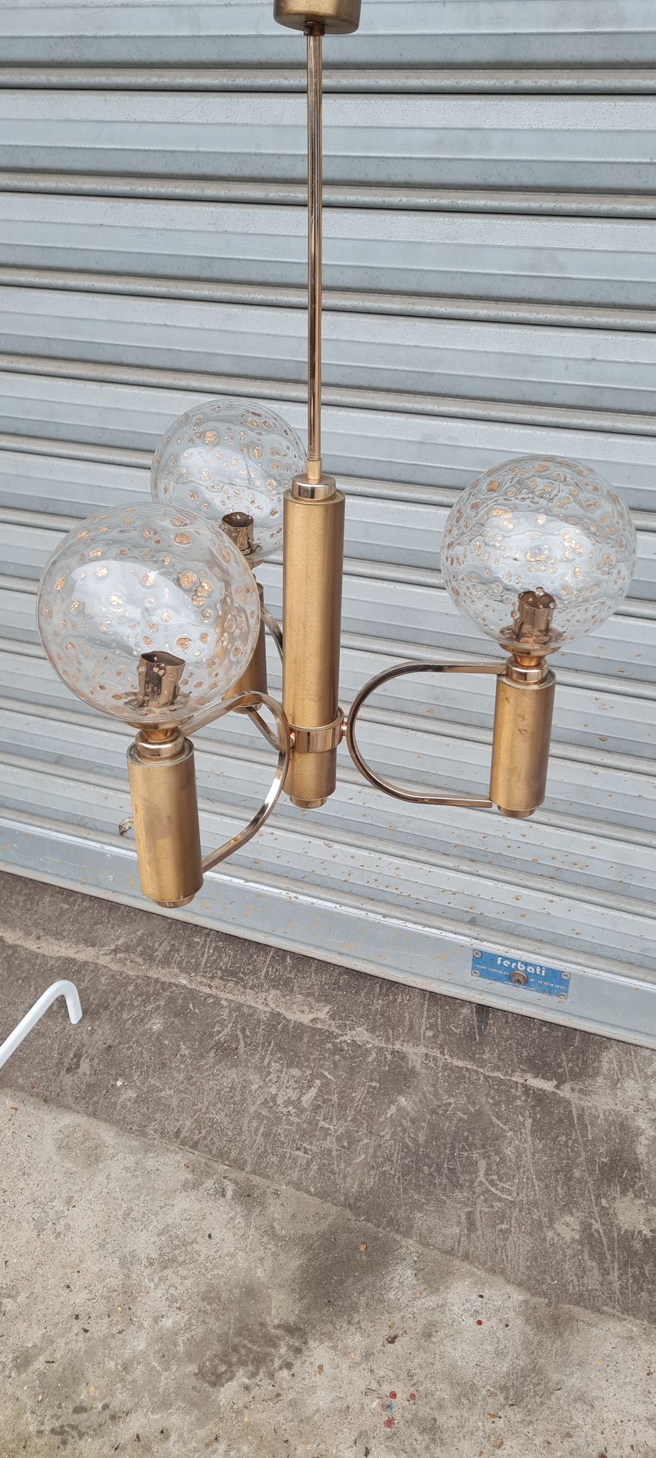 Brass and blown glass chandelier inlaid with gold