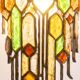 Wrought iron and colored glass wall light. 1960s.
