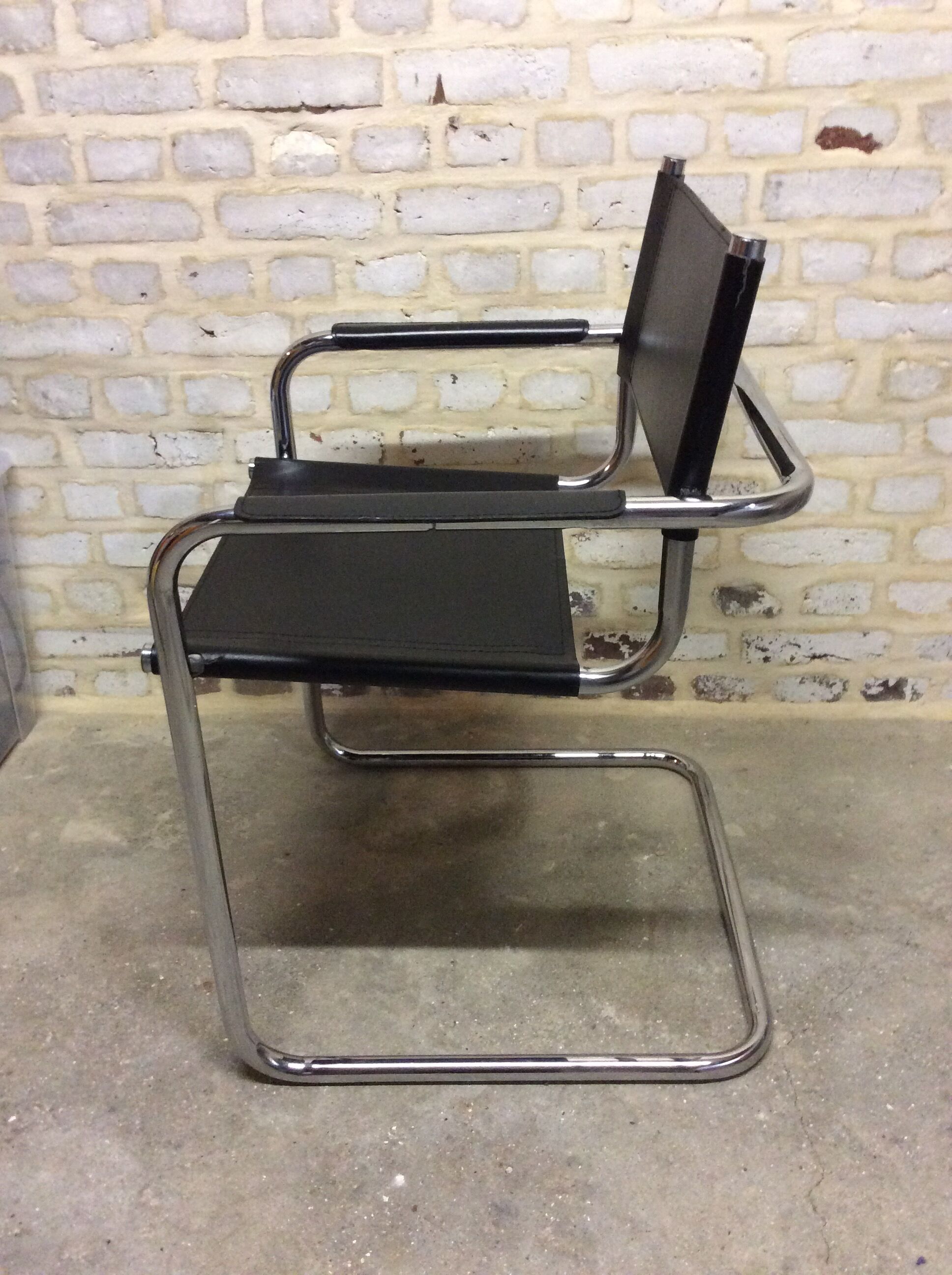 Chair leatherette and brass