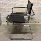 Chair leatherette and brass