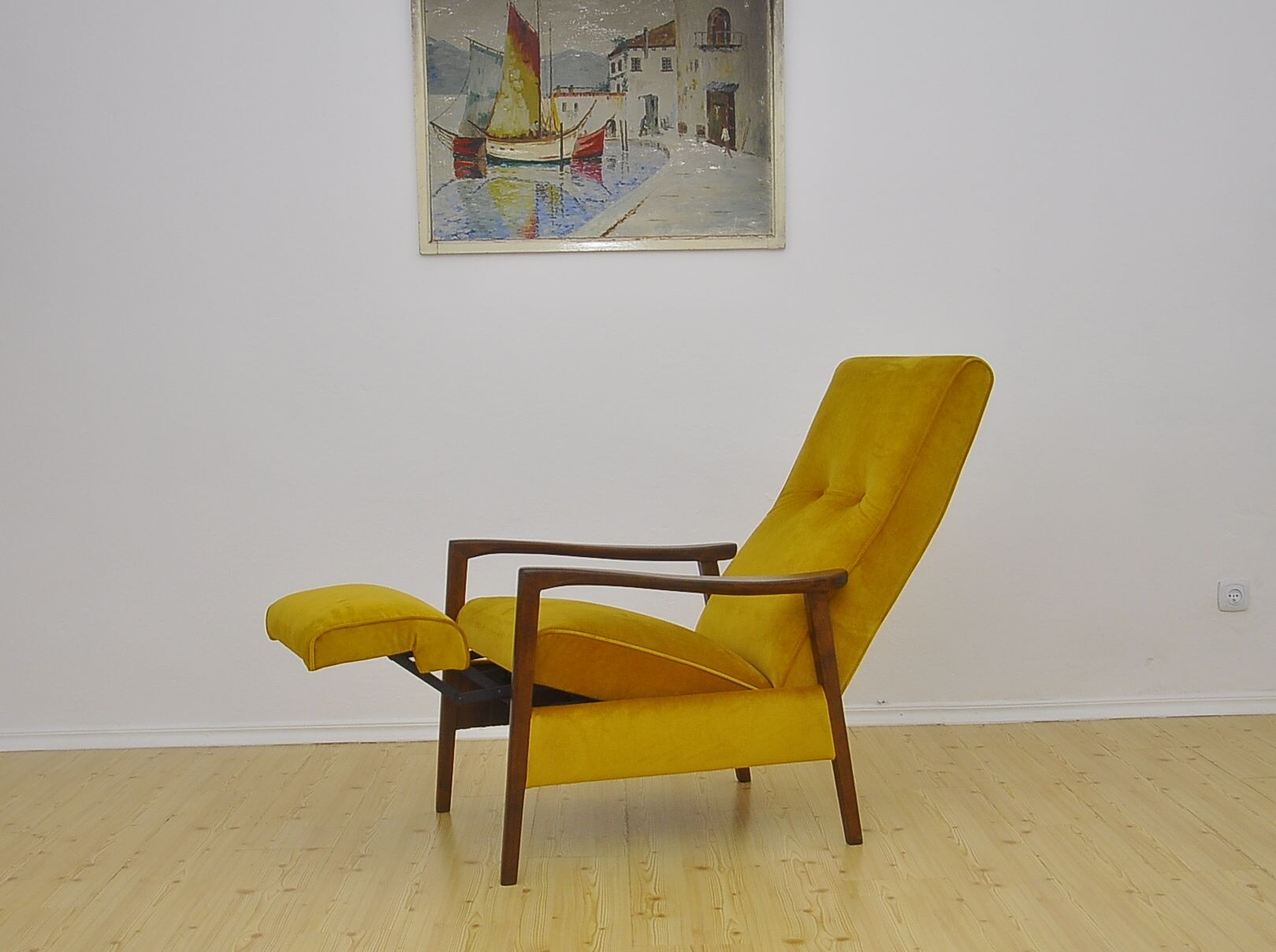 Mid-century armchair with folding footrest, 1960s