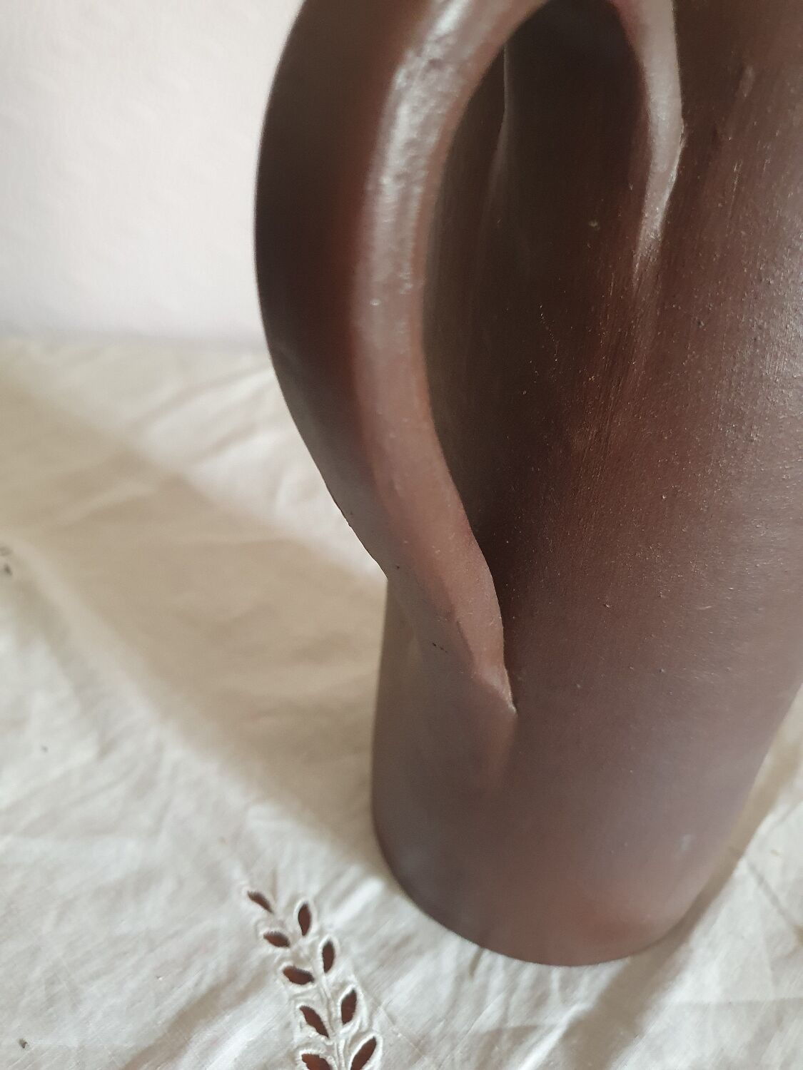 Vintage enameled stoneware pitcher signed