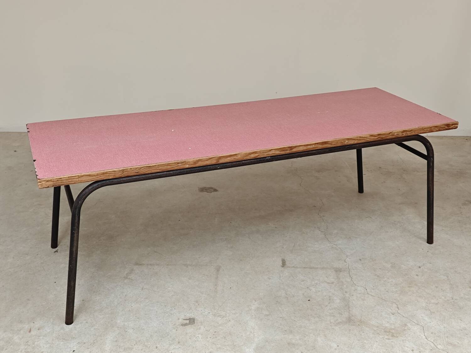 Large canteen table in pink formica and metal.