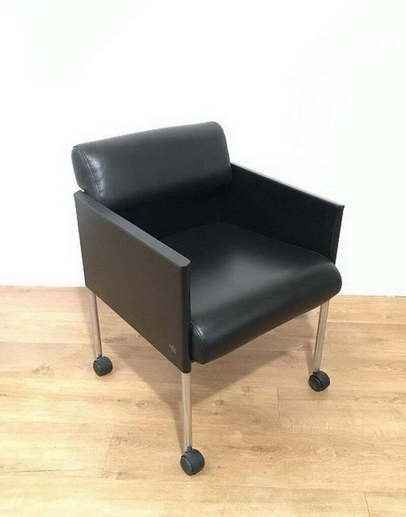 Set of 4 armchairs in leather and black lacquered metal. Rosenthal