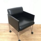 Set of 4 armchairs in leather and black lacquered metal. Rosenthal