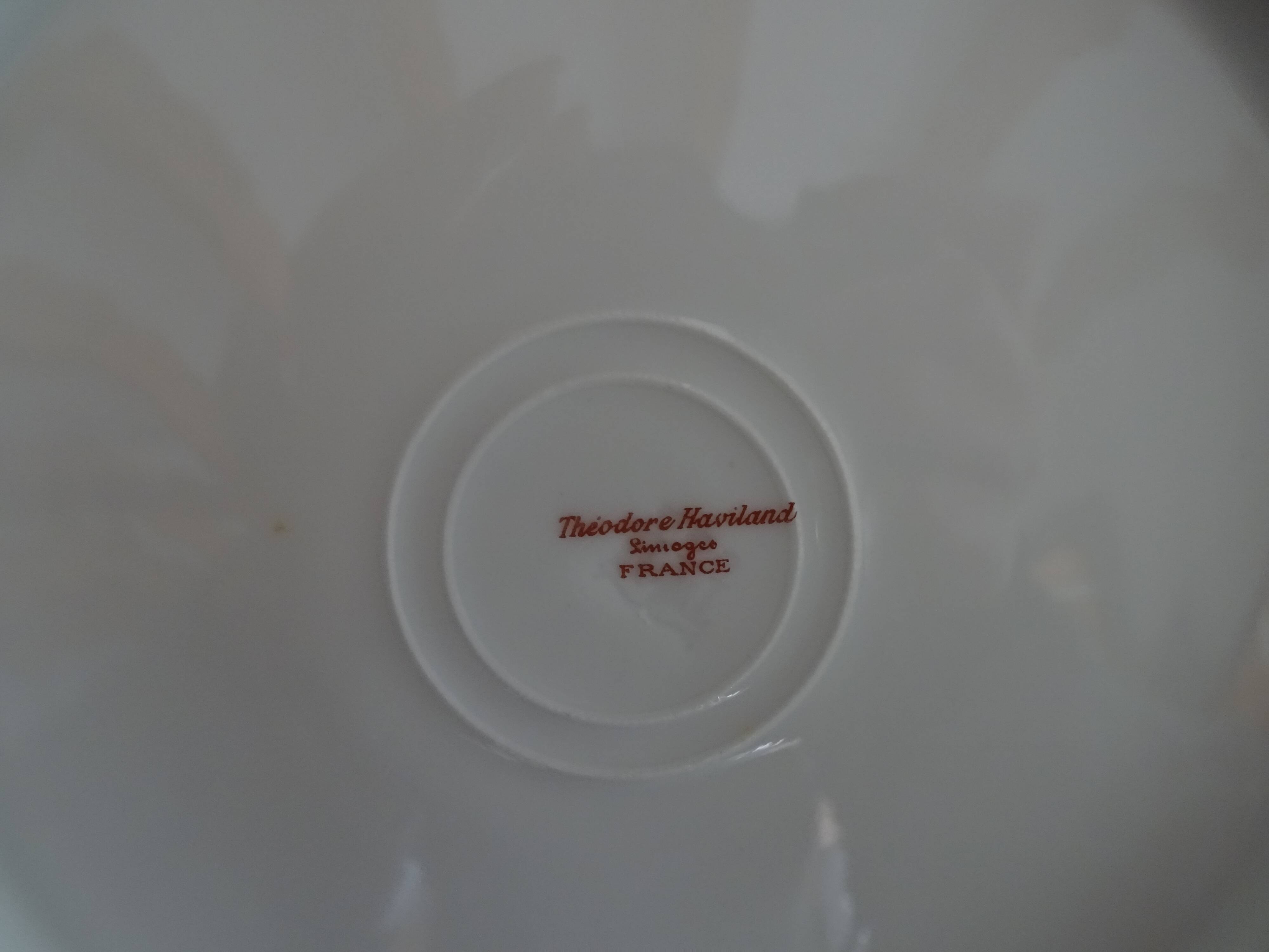 4 assiettes plates porcelaine Limoges Theodore Haviland motifs Art Deco Ø 24, cm