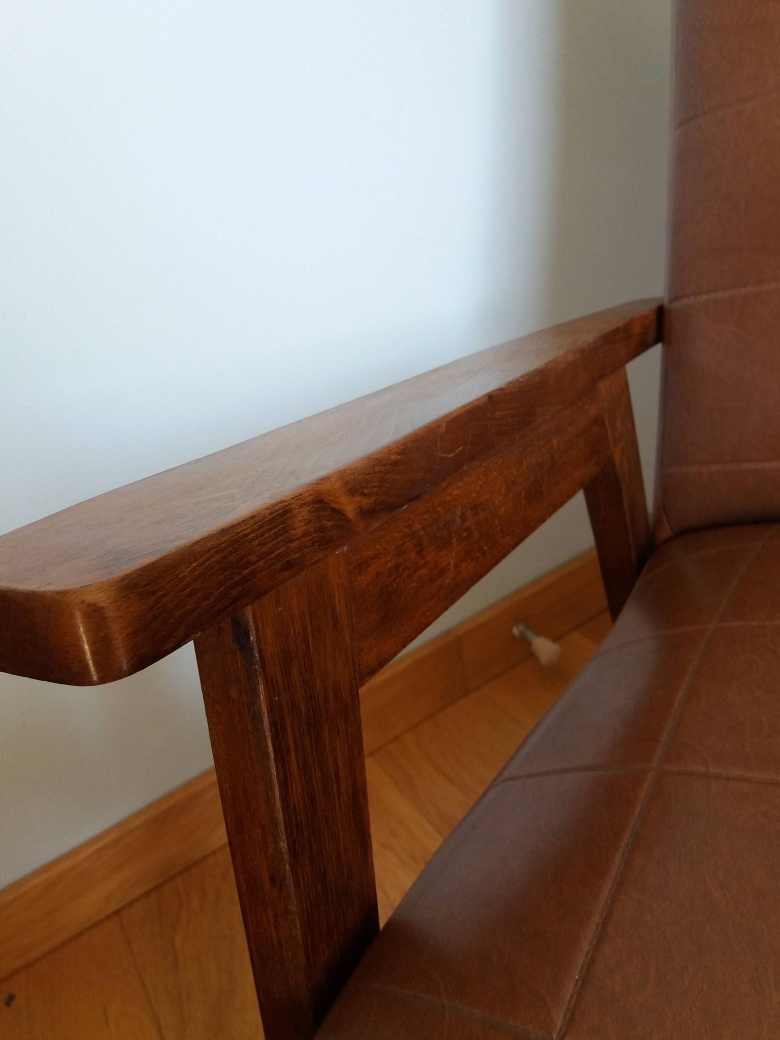 Scandinavian brown skai and wood armchair